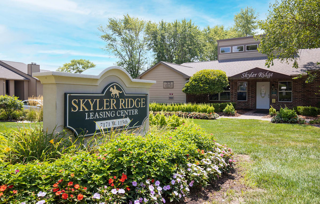 Exterior of Skyler Ridge Apartments clubhouse with the apartment signage.