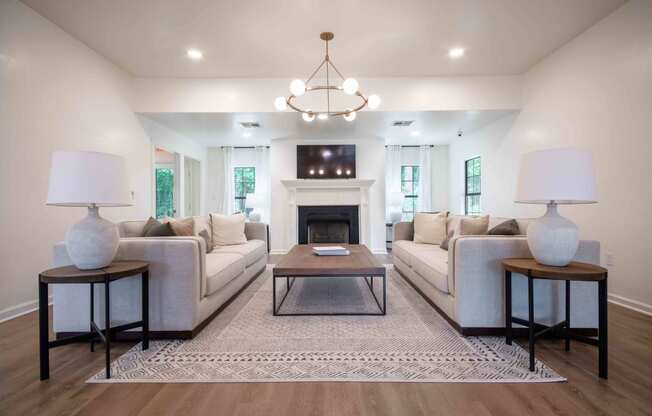 a living room with couches and a table