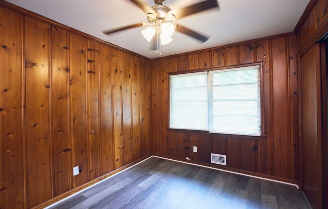 Vintage Charm with Modern Upgrades and Sunroom Living