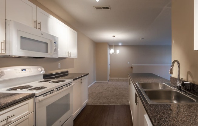This is a photo of the kitchen in the 1040 square foot 2 bedroom, 1 bath Patriot at Washington Place Apartments in Miamisburg, Ohio in Washington Township.