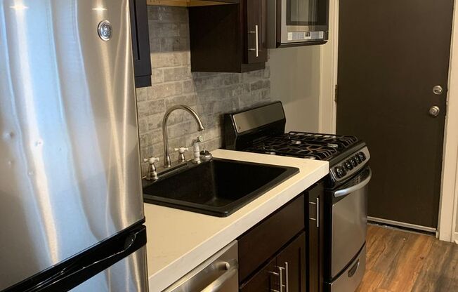 315-321 1/2 Denniston