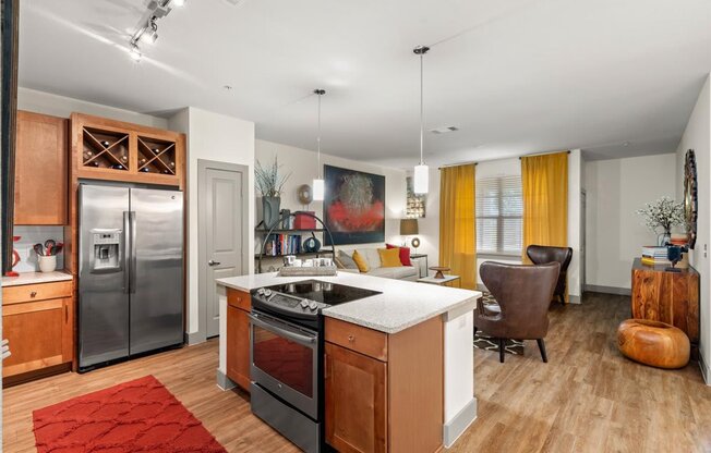 a kitchen and living room in a 555 waverly unit