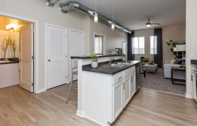 Kitchen work island with sink in  kitchen/dining area | Apartment in Des Moines, Iowa | Cityville I