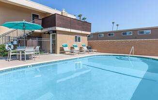 a pool next to a building