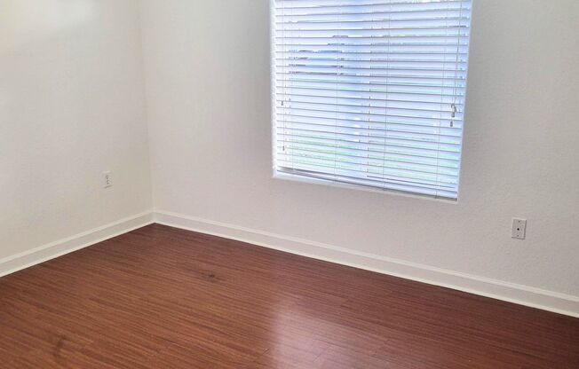 Single-story, 3/2.5 corner lot located near multiple FL Turnpike exits