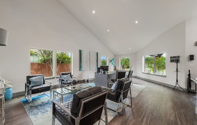 a living room with couches and chairs and a table  at Shadow Ridge, Arlington, 76013