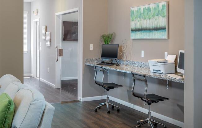 a home office with a desk and a computer