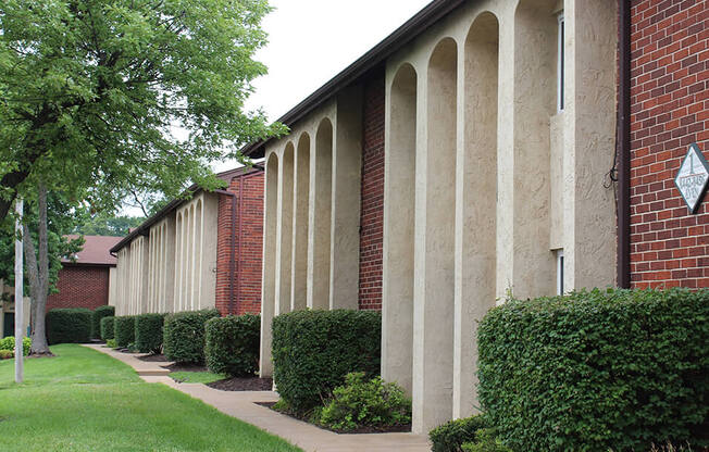 a row of columns on the side of a building