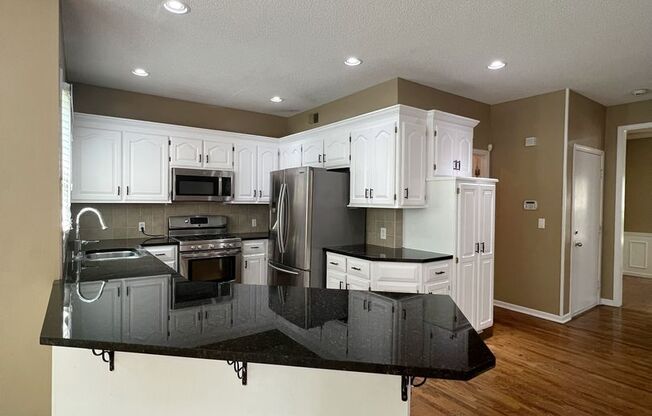 SEE IT NOW: Spacious 4-Bed Home with Finished Basement & 3-Car Garage!