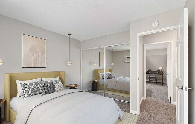 Model Bedroom with Carpet and Closet at Horizon Apartments located in Santa Ana, CA.