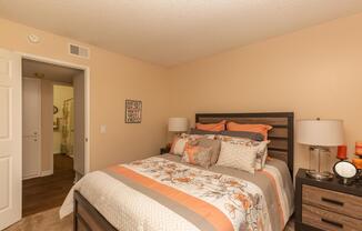 a bedroom with a bed in a hotel room