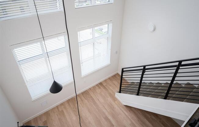 an overhead view of a bedroom with a bed and a window