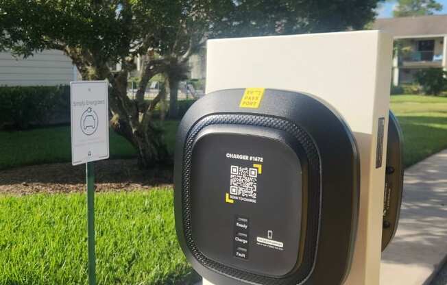 a parking meter on the side of a sidewalk