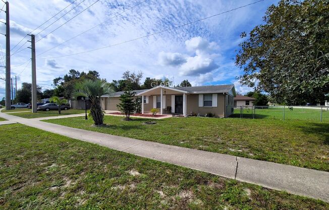 Charming 3-Bedroom Home with Spacious Backyard & 2-Car Garage.