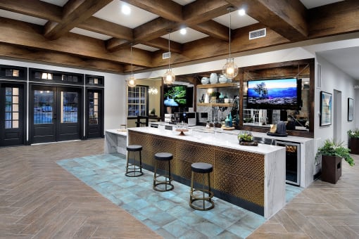 a large kitchen with a large island and a television at Willowest in Collier Hills, Atlanta, GA