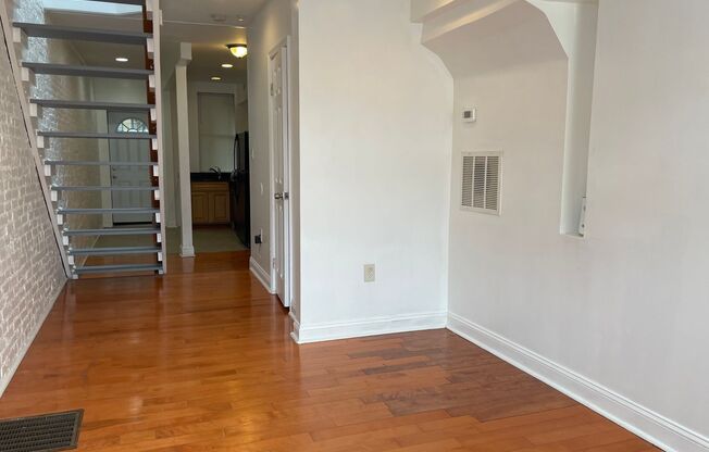 Charming 2-Bedroom, 1.5-Bathroom Brick Townhouse in Pigtown