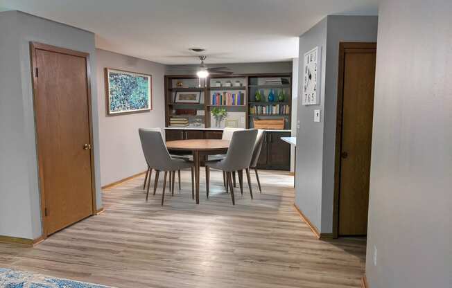 A Renovated a dining room and kitchen with a table and chairs