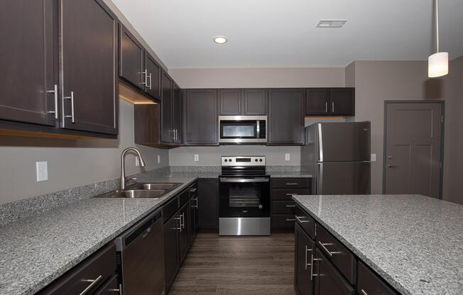 a modern kitchen with stainless steel appliances