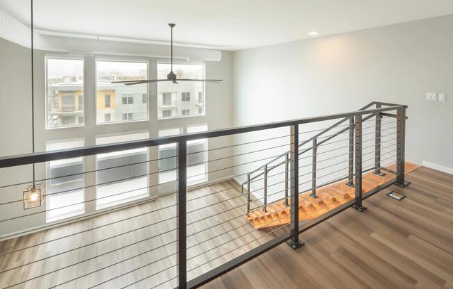 Enjoy floor-to-ceiling windows featured in our loft apartment homes.