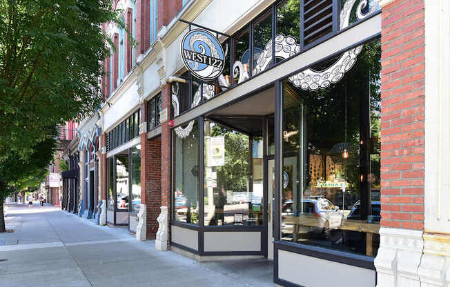 A storefront with a sign that says West 127.