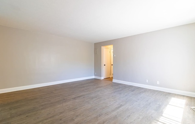 Bedroom with vinyl plank flooring