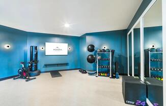 Find your rhythm in the fitness studio—perfect for interval training, yoga, or a solo session on the Peloton.