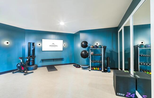 Find your rhythm in the fitness studio—perfect for interval training, yoga, or a solo session on the Peloton.