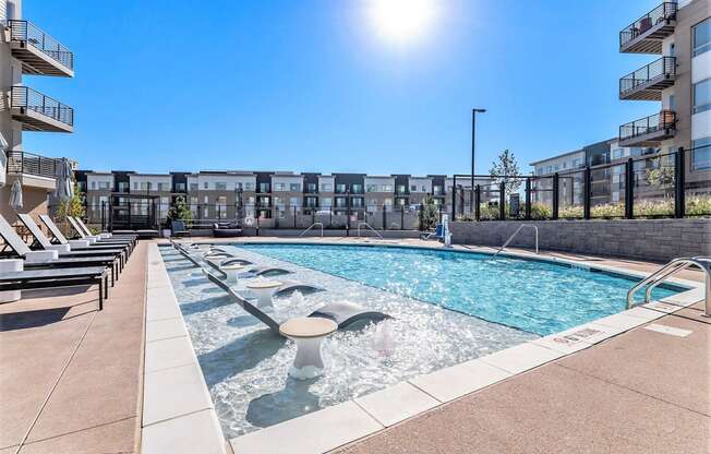 our apartments have a resort style pool with lounge chairs