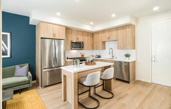 Gourmet kitchens with quartz countertops, 42-inch custom cabinetry, and upgraded fixtures