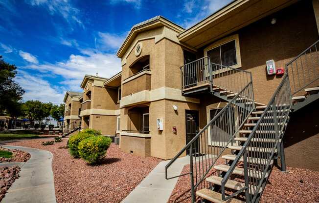 A building with a staircase leading to the second floor.