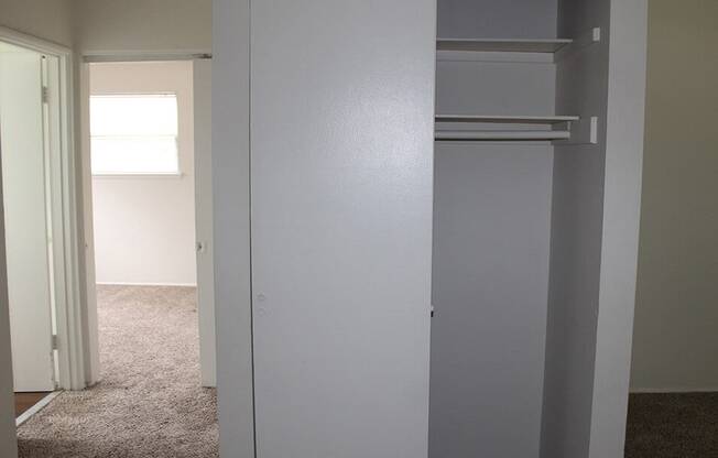 a white refrigerator freezer sitting inside of a room
