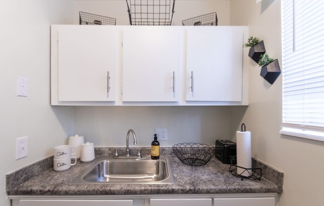 This is a picture of the kitchen in a 576 sq foot 1 bedroom, 1 bath apartment at Red Bank Reserve in the Madisonville neighborhood of Cincinnati, Ohio.