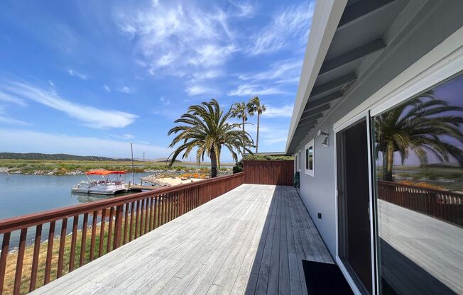 WATERFRONT HOME IN BEL MARIN KEYS WITH BOAT DOCK, FENCED YARD.