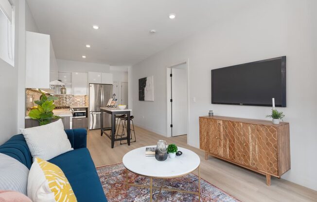 a living room with a couch and a table