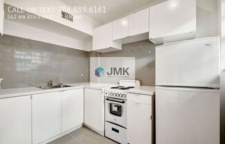 542 NW 8 ST