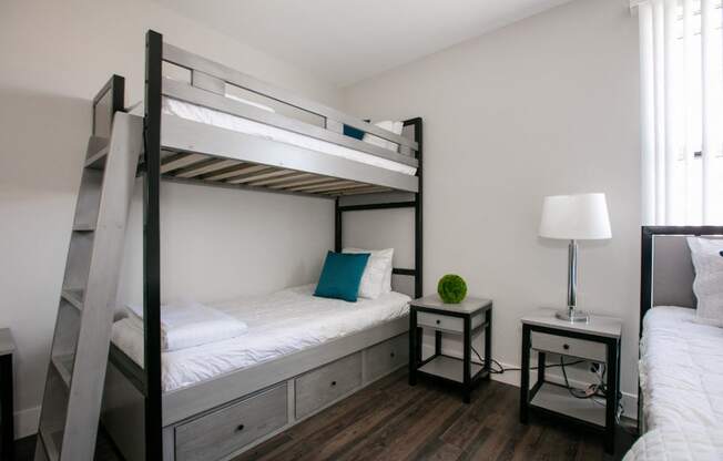 Bedroom with bunk bed at Midvale Apartments, Los Angeles