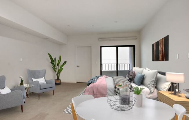 a living room with white walls and a white table and chairs