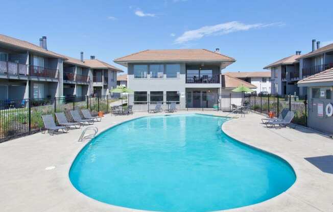 Evergreen Ridge Pool with Lounge Chairs