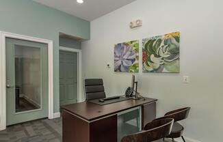 a room with a desk and chair