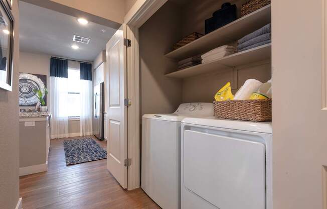 A laundry room with a washer and dryer.