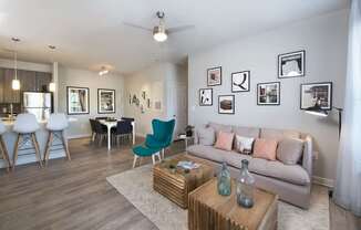 Spacious living room with hardwood-inspired flooring
