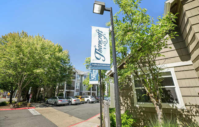 A street view of a building with a sign that says "Trinity's".