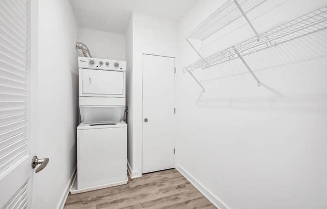 Model Laundry Room with Washer & Dryer at Stella Apartments located in New Carrollton, MD.