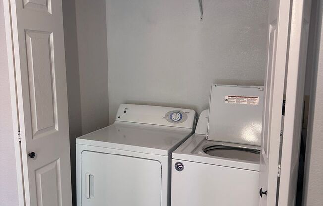 Updated Westside downstairs apartment in the Forest Condominiums just off Newport!