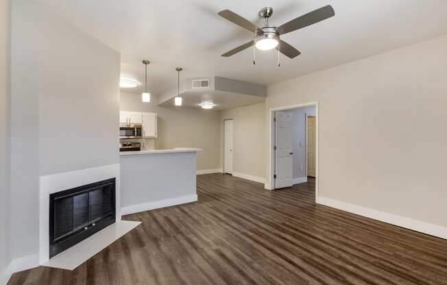 Experience cozy comfort in our lounge featuring a welcoming fireplace at Boulders at Lookout Mountain Apartment Homes, Phoenix