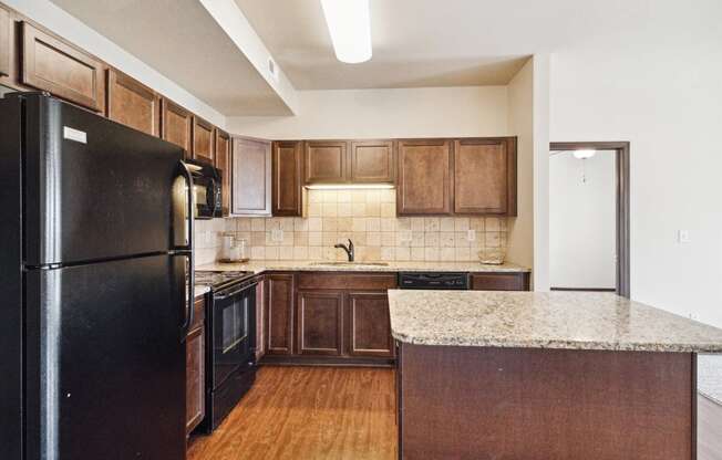 Kitchen with Dark Wood Cabinets