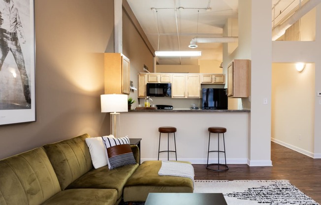 Living Room With Kitchen View at Harness Factory Lofts and Apartments, Indiana