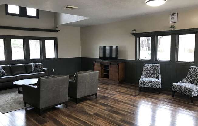 Posh Lounge Area In Clubhouse at Hickory Village Apartments, Mishawaka, IN