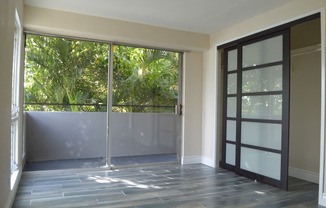 Napili Towers bedroom with closet and glass doors to the balcony