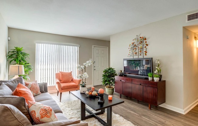 Living Room With TV at The Reserve at City Center North, Houston, TX